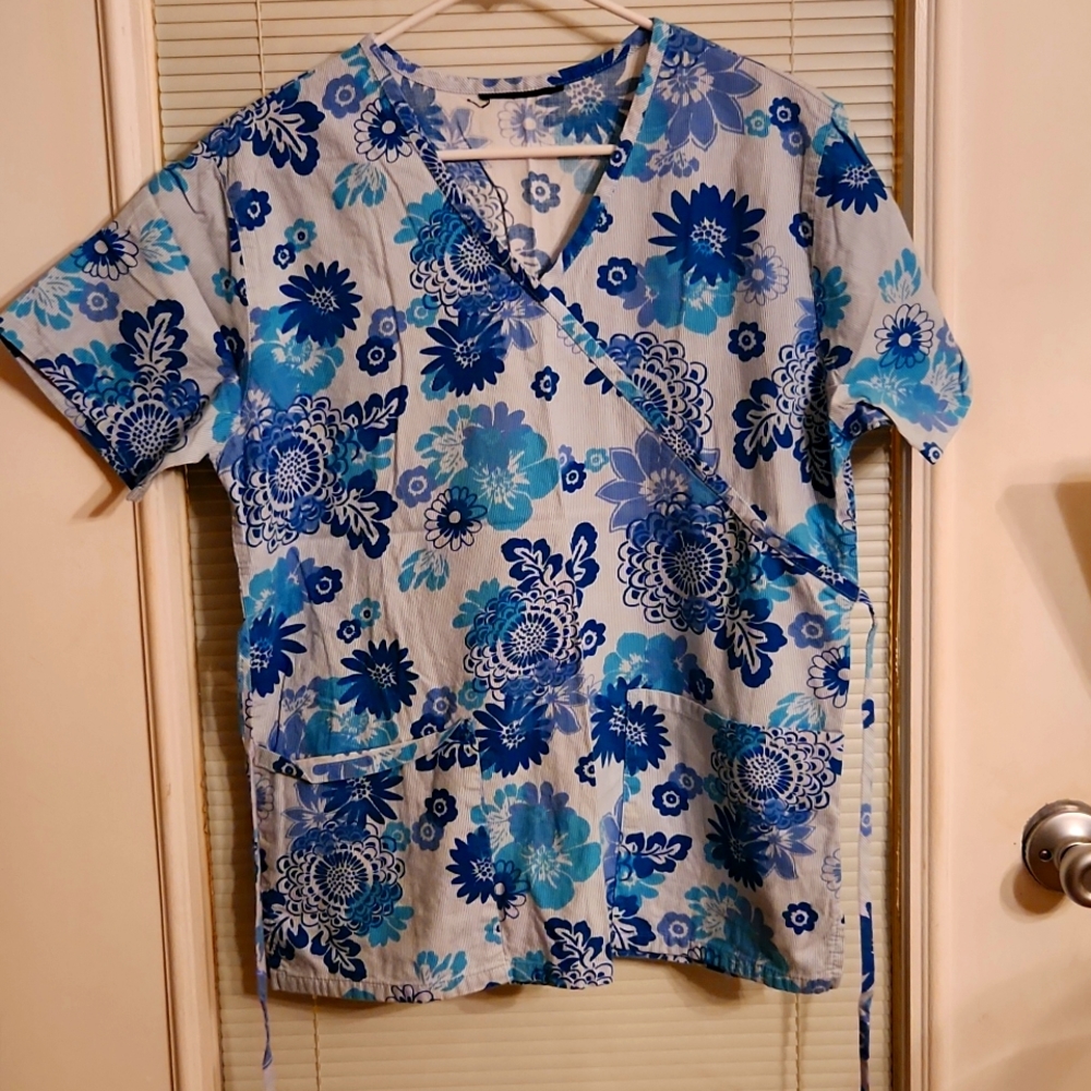 Scrub Blue and white floral and vertical lines with tie in back to cinch waist